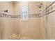 Large walk-in shower with multiple shower heads at 1519 Lake Rhea Dr, Windermere, FL 34786
