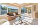 Relaxing sitting area with view of the pool at 1519 Lake Rhea Dr, Windermere, FL 34786