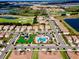Community features a pool, playground, and houses surrounding a golf course at 1582 Moon Valley Dr, Champions Gate, FL 33896
