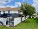 Private backyard with screened-in pool and grill at 1582 Moon Valley Dr, Champions Gate, FL 33896
