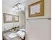 Bathroom with granite vanity and updated fixtures at 1582 Moon Valley Dr, Champions Gate, FL 33896
