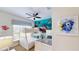 Fun ' bedroom with bunk beds and ocean mural at 1582 Moon Valley Dr, Champions Gate, FL 33896