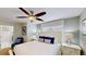 Main bedroom with ceiling fan and plenty of light at 1582 Moon Valley Dr, Champions Gate, FL 33896