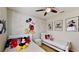 Mickey Mouse themed bedroom with twin beds at 1582 Moon Valley Dr, Champions Gate, FL 33896