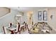 Bright dining room with table, chairs and granite counter at 1582 Moon Valley Dr, Champions Gate, FL 33896