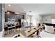 Modern kitchen boasts granite countertops and stainless steel appliances at 1582 Moon Valley Dr, Champions Gate, FL 33896