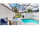 Private screened pool and patio with grill at 1582 Moon Valley Dr, Champions Gate, FL 33896