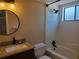 Bathroom with granite countertop, tub, and shower at 1902 Abbington St # 1902, Apopka, FL 32712