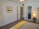 Main bedroom with ensuite bathroom and neutral color scheme at 1902 Abbington St # 1902, Apopka, FL 32712