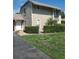 Tan two-story house with white door and well-manicured lawn at 1902 Abbington St # 1902, Apopka, FL 32712