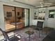 Sunroom with seating area and sliding glass doors at 1902 Abbington St # 1902, Apopka, FL 32712