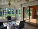 Bright sunroom with multiple windows and sliding doors at 1902 Abbington St # 1902, Apopka, FL 32712