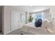 Main bedroom with a large bed and window at 1960 Tamarack Pass, Davenport, FL 33837