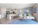 Open concept living area with kitchen and seating area at 1960 Tamarack Pass, Davenport, FL 33837