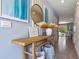 Entryway with console table, mirror, and a view into the dining area at 2191 Longleaf Rd, Davenport, FL 33837