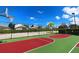 Community basketball court with two hoops at 2302 Butterfly Palm Way # 102, Kissimmee, FL 34747