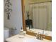 Bathroom with walk-in shower and updated vanity with mirror at 2302 Butterfly Palm Way # 102, Kissimmee, FL 34747