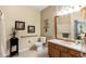 Accessible bathroom with walk-in shower and modern vanity at 2302 Butterfly Palm Way # 102, Kissimmee, FL 34747