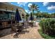Outdoor patio furniture near pool and bar, great for entertaining at 2302 Butterfly Palm Way # 102, Kissimmee, FL 34747