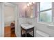 Updated bathroom with vanity, toilet and shower at 3644 Lake Shore Dr, Apopka, FL 32703