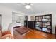 Bright bedroom with hardwood floors and ample closet space at 3644 Lake Shore Dr, Apopka, FL 32703