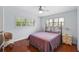 Bright bedroom with double bed and hardwood floors at 3644 Lake Shore Dr, Apopka, FL 32703