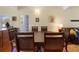 Traditional dining room with dark wood table and chairs at 3644 Lake Shore Dr, Apopka, FL 32703