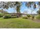 Ranch style home with mature landscaping and a spacious yard at 3644 Lake Shore Dr, Apopka, FL 32703