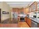 Updated kitchen with granite island and stainless steel appliances at 3644 Lake Shore Dr, Apopka, FL 32703