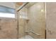 Walk-in shower with glass enclosure and tiled walls at 3644 Lake Shore Dr, Apopka, FL 32703