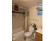 Bathroom with shower/tub combo and beige tile at 4419 Lake Lawne Ave, Orlando, FL 32808