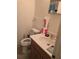Small bathroom with a toilet, sink and shower/tub combo at 4419 Lake Lawne Ave, Orlando, FL 32808