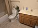 Bright bathroom with a toilet and sink vanity at 4419 Lake Lawne Ave, Orlando, FL 32808