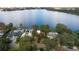 Wide shot of the lake and surrounding homes at 541 Virginia Dr, Winter Park, FL 32789