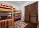 Charming bedroom with bunk beds and a built-in closet at 541 Virginia Dr, Winter Park, FL 32789