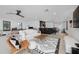 Spacious game room with comfortable seating and bar area at 541 Virginia Dr, Winter Park, FL 32789