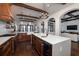 Gourmet kitchen with island, high-end appliances, and hardwood floors at 541 Virginia Dr, Winter Park, FL 32789