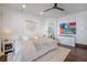 Relaxing main bedroom with large bed, ample natural light, and hardwood floors at 541 Virginia Dr, Winter Park, FL 32789