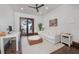 Home office with water views, comfortable seating, and hardwood floors at 541 Virginia Dr, Winter Park, FL 32789