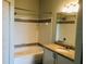 Bathroom with tub, granite vanity, and shower at 6413 Astor Village Ave # 314, Orlando, FL 32835