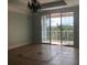 Bright dining room with access to a private balcony at 6413 Astor Village Ave # 314, Orlando, FL 32835