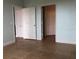 Hallway with tile floors and multiple doors to bedrooms at 6413 Astor Village Ave # 314, Orlando, FL 32835