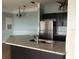 Kitchen features granite countertops and stainless steel appliances at 6413 Astor Village Ave # 314, Orlando, FL 32835