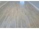 Clean light grey wood-look tile flooring at 821 E 1St Ave, New Smyrna Beach, FL 32169