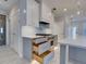 Modern kitchen with gray cabinets and drawers at 821 E 1St Ave, New Smyrna Beach, FL 32169