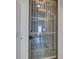 Glass-front wine cellar offering convenient access to wines at 821 E 1St Ave, New Smyrna Beach, FL 32169