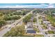 Aerial view of residential neighborhood with houses and roads at 9606 Chandon Dr, Orlando, FL 32825