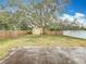 Fenced backyard with storage shed at 9606 Chandon Dr, Orlando, FL 32825