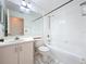 Clean bathroom with a shower/tub combo and white vanity at 9606 Chandon Dr, Orlando, FL 32825