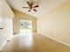 Spacious bedroom featuring tile floors and access to a private backyard at 9606 Chandon Dr, Orlando, FL 32825